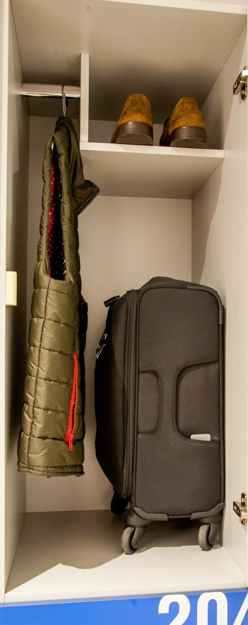 Izzzleep Aeropuerto Terminal 2 Hôtel capsule Mexico